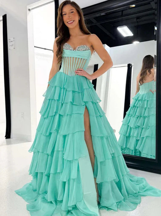 Layered beaded strapless prom dress in turquoise with tiered chiffon A-line skirt