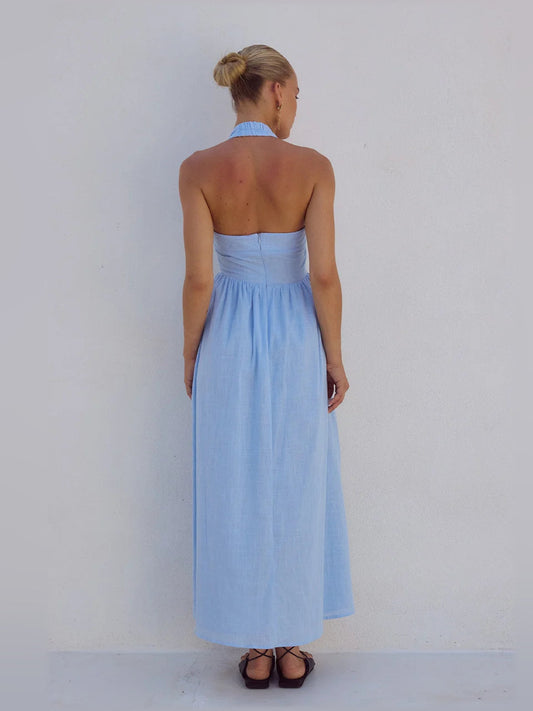 Ice blue midi formal dress back view with halter straps and cinched waist