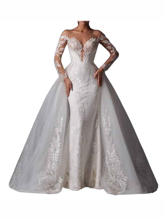 White corset wedding dress with deep V front, sheer lace sleeves, and full A-line tulle skirt.