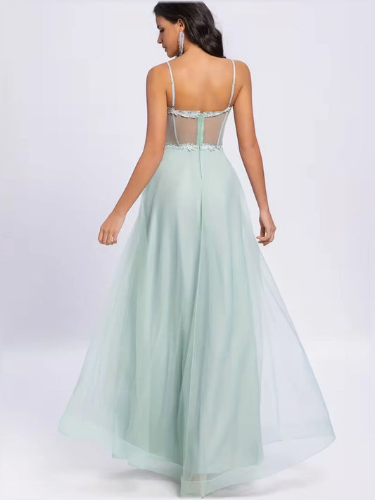 Mint green thin-strap back formal dress with lace bodice and full floor-length skirt
