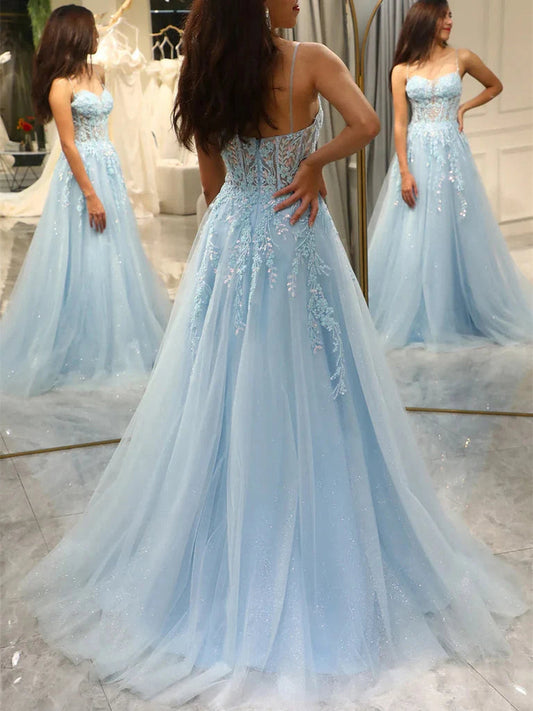Light blue sleeveless A-line prom dress, back view with tulle skirt and beaded details