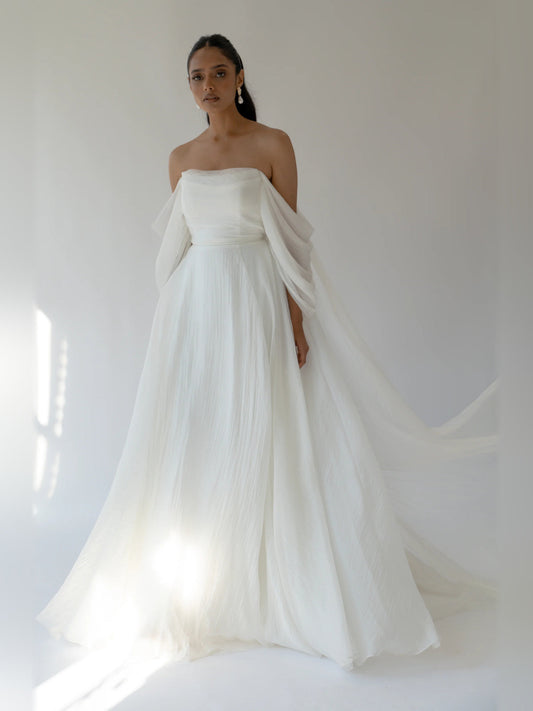 Ivory A-line floor-length formal dress with off-shoulder draped sleeves and full skirt