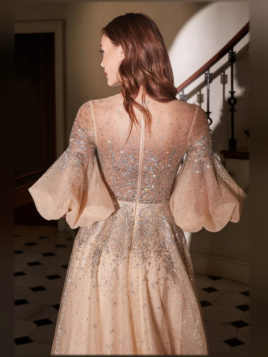 Champagne beaded A-line formal dress, back view with puff sleeves