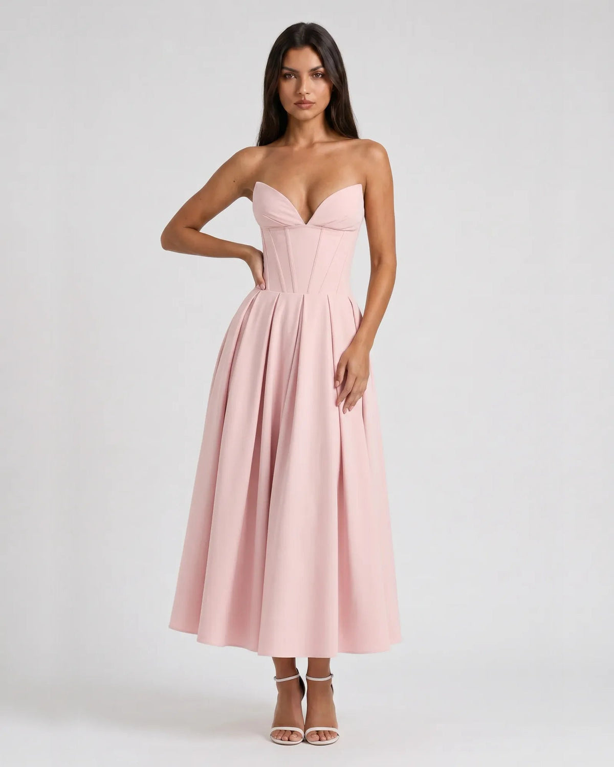 Pink strapless sweetheart corset midi formal dress with fitted bodice and pleated skirt