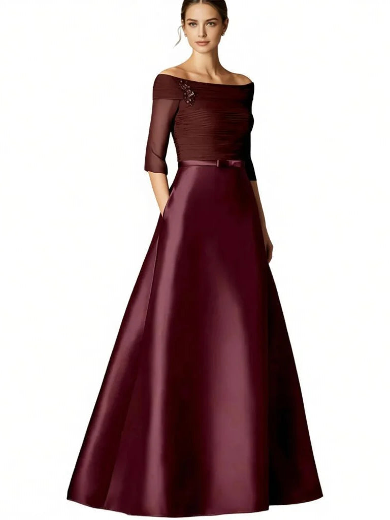 Burgundy satin A-line off-shoulder dress with ruched bodice and three-quarter sleeves