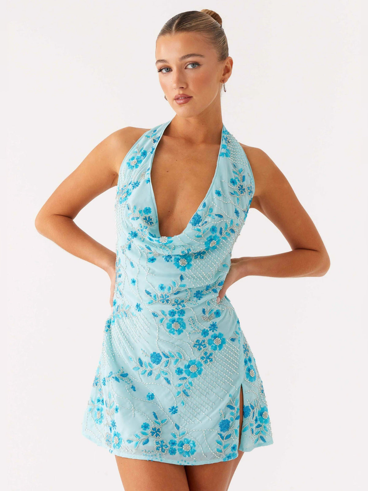 Blue beaded mini homecoming dress with halter neckline and layered ruffle detail