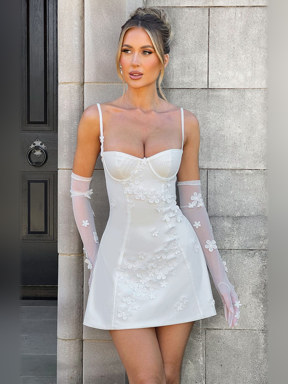 Ivory mini dress with sweetheart neckline, floral lace appliques, sheer floral gloves