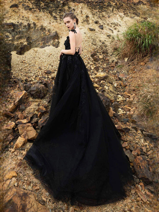Black V-neck ball gown wedding dress with floral bodice, layered tulle skirt & side slit