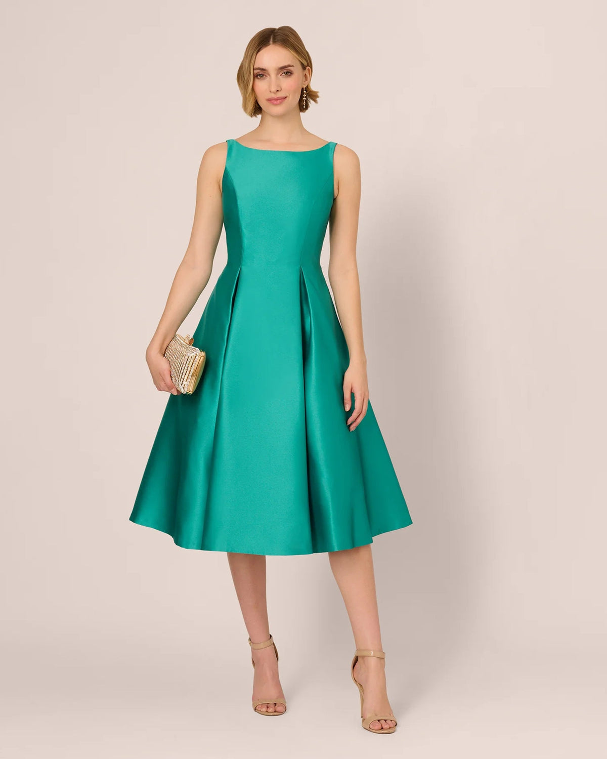 Emerald green sleeveless fit-and-flare midi dress, scoop neckline, pleated skirt