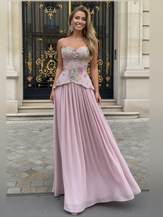 Dusty pink sweetheart formal dress with floral beadwork and pleated floor-length skirt
