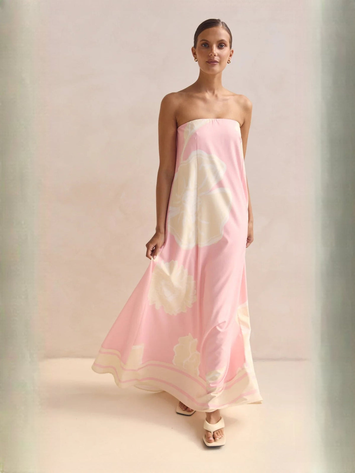 Pink Cream Abstract Print a-line maxi formal dress with strapless neckline, full-length front view