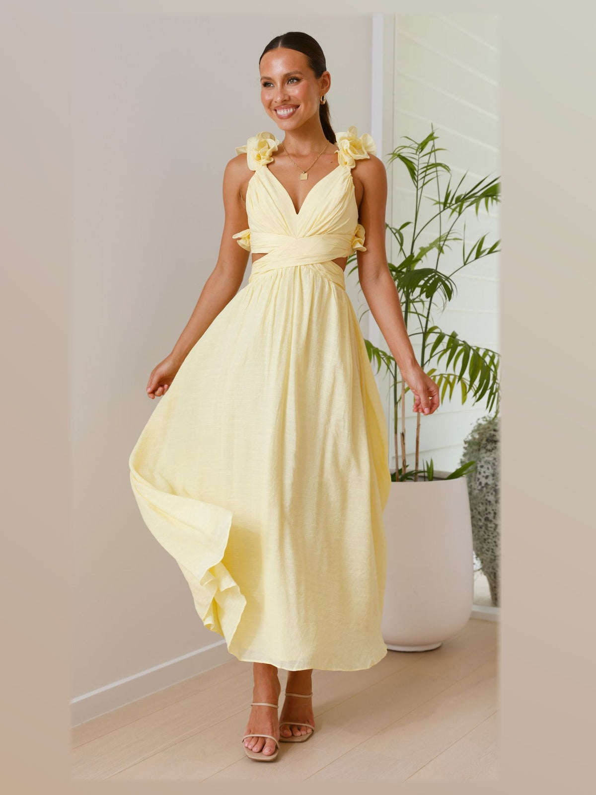 Yellow maxi formal dress, front full-length view showing the neckline