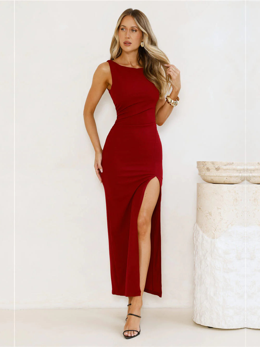 Burgundy sheath maxi formal dress with skirt slit, full-length front view