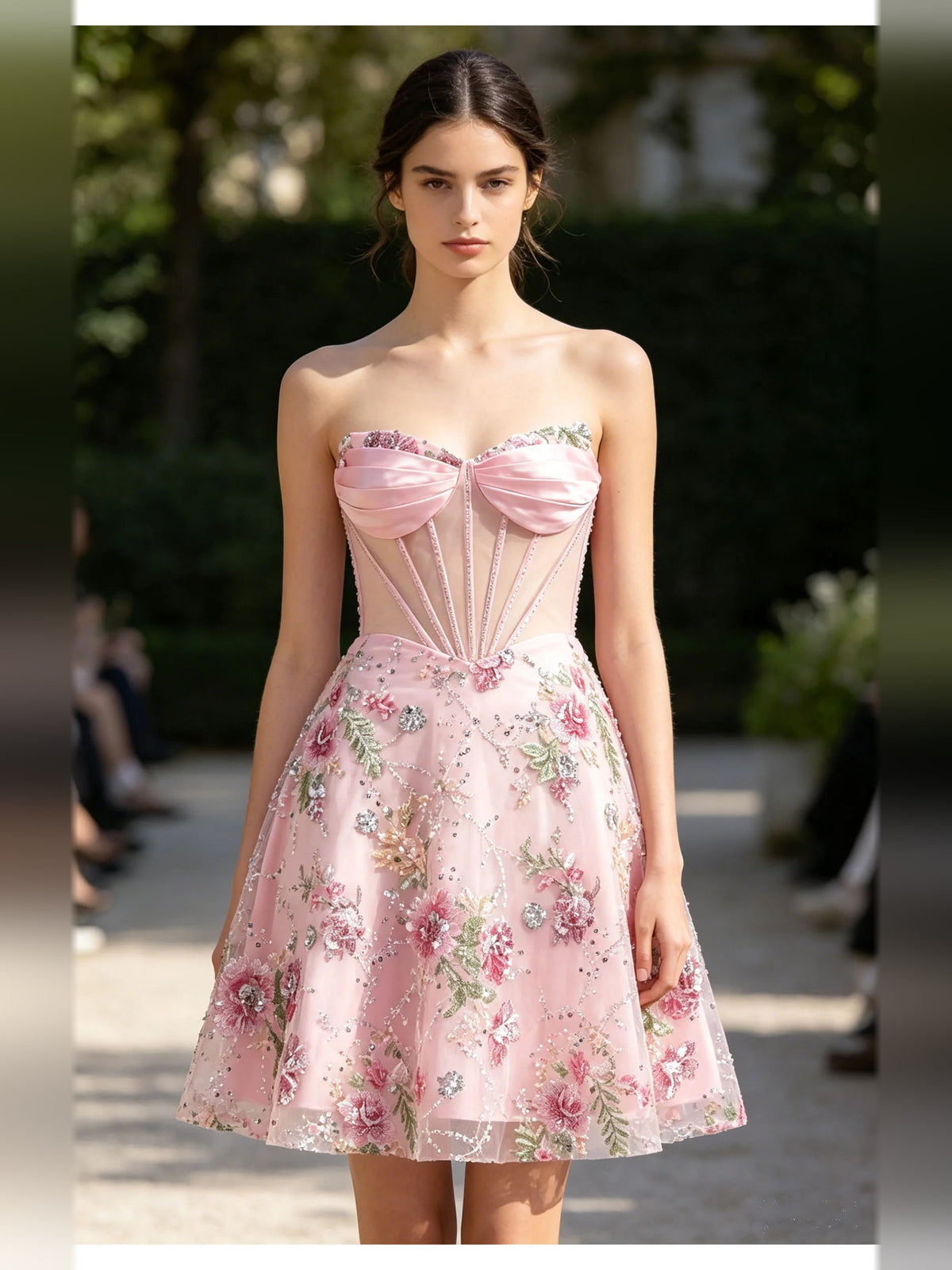 Light pink strapless corset homecoming dress with pleated A-line floral skirt