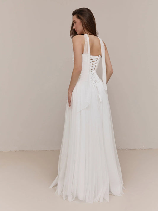 Ivory strapless wedding dress with ruched bodice and A-line floor-length skirt, back view