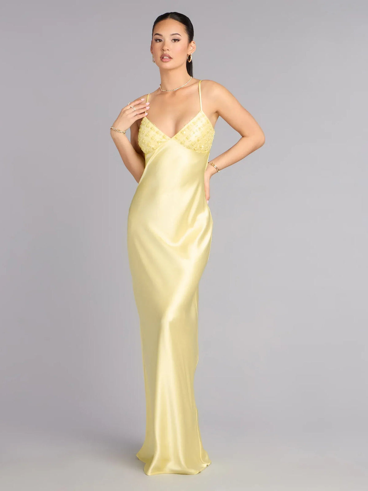 Yellow satin spaghetti strap formal dress with beaded sweetheart neckline, floor-length