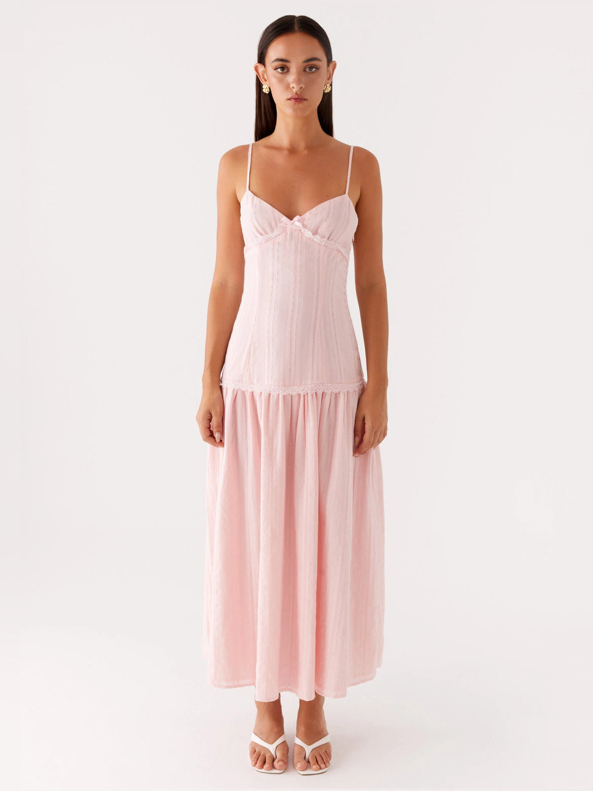 Pink midi formal dress with spaghetti straps, V-neck, and tiered skirt