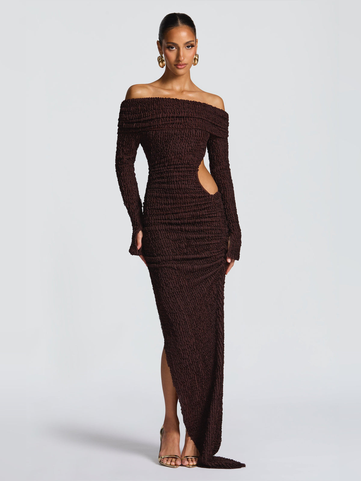 Brown midi formal dress with off-shoulder neckline, long sleeves, and high slit