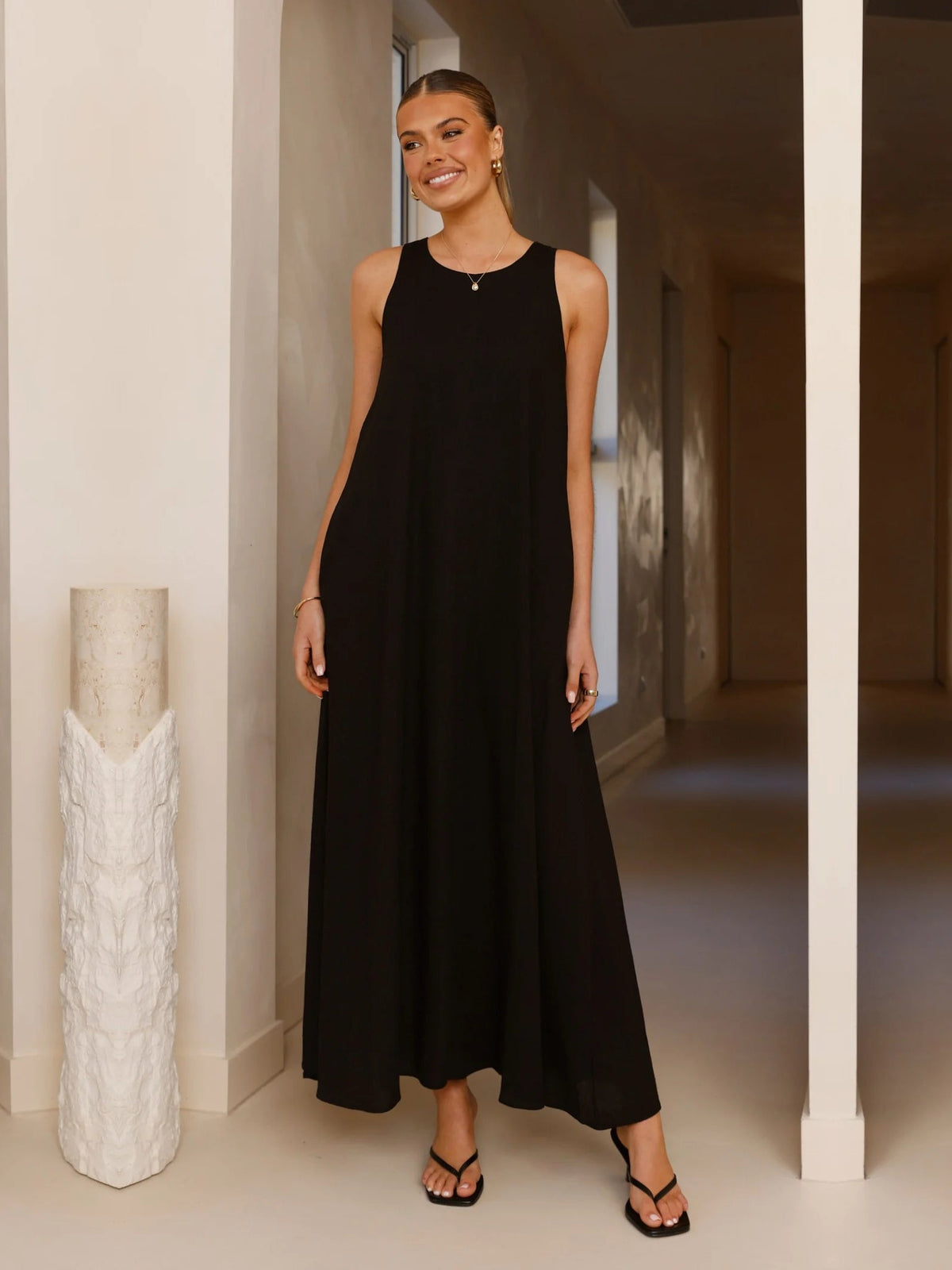 Black a-line maxi formal dress with a-line, full-length front view