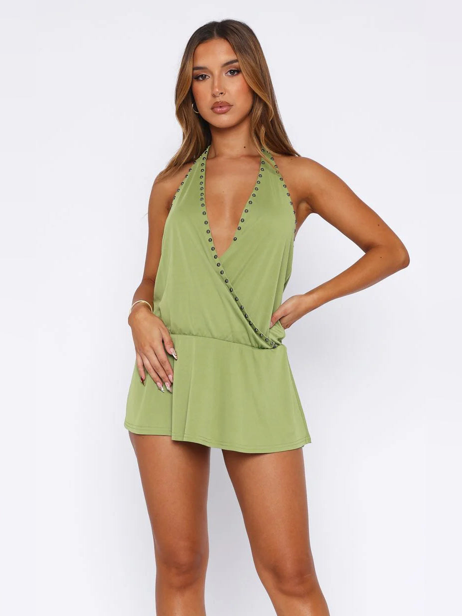 Olive plunging halter mini dress with ruffled skirt and stud trim