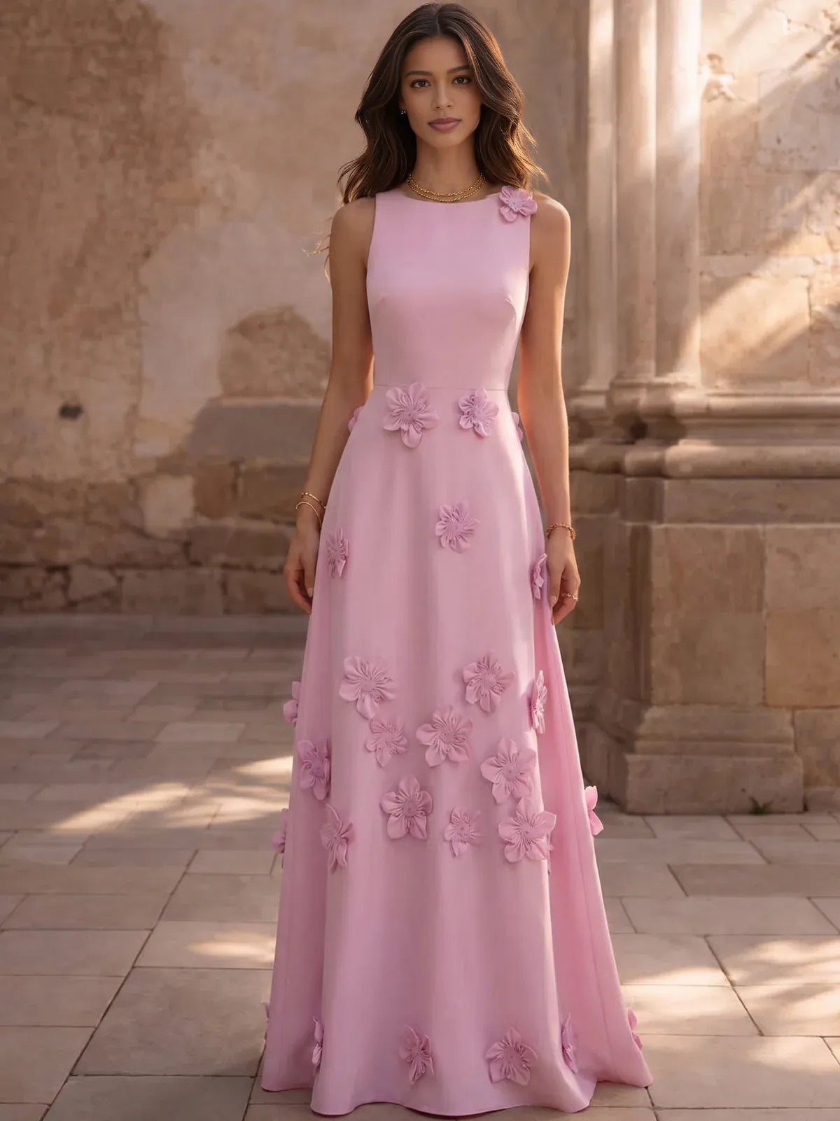 Pink sleeveless A-line floor-length dress with floral appliqués