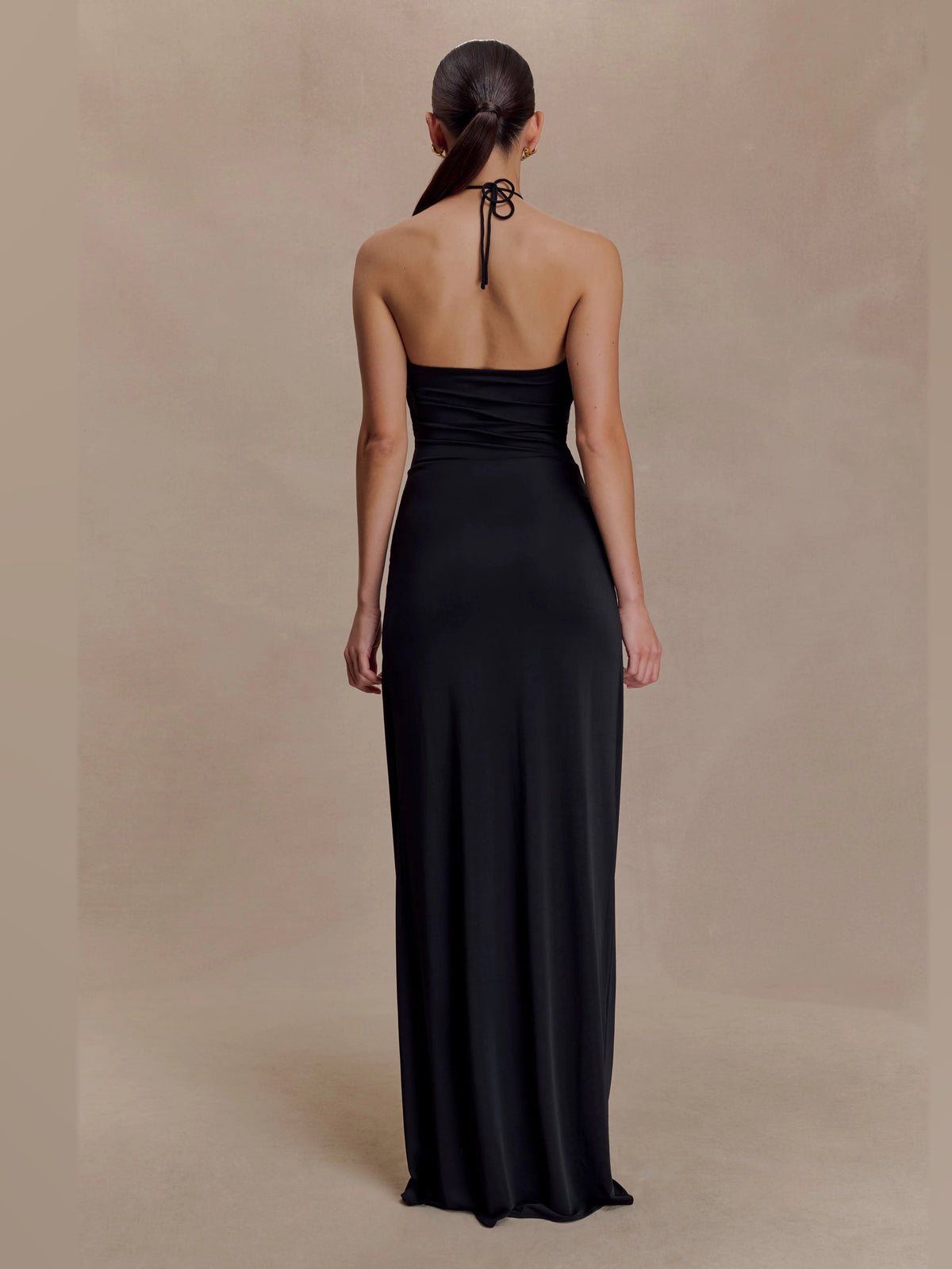 Black formal dress with a-line silhouette and maxi length