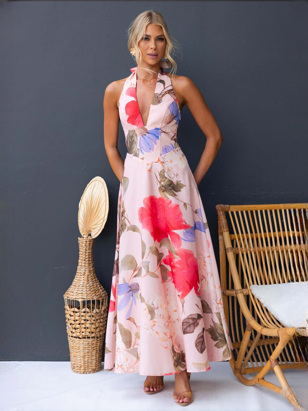Pink Floral Print a-line maxi formal dress with halter neckline, full-length front view
