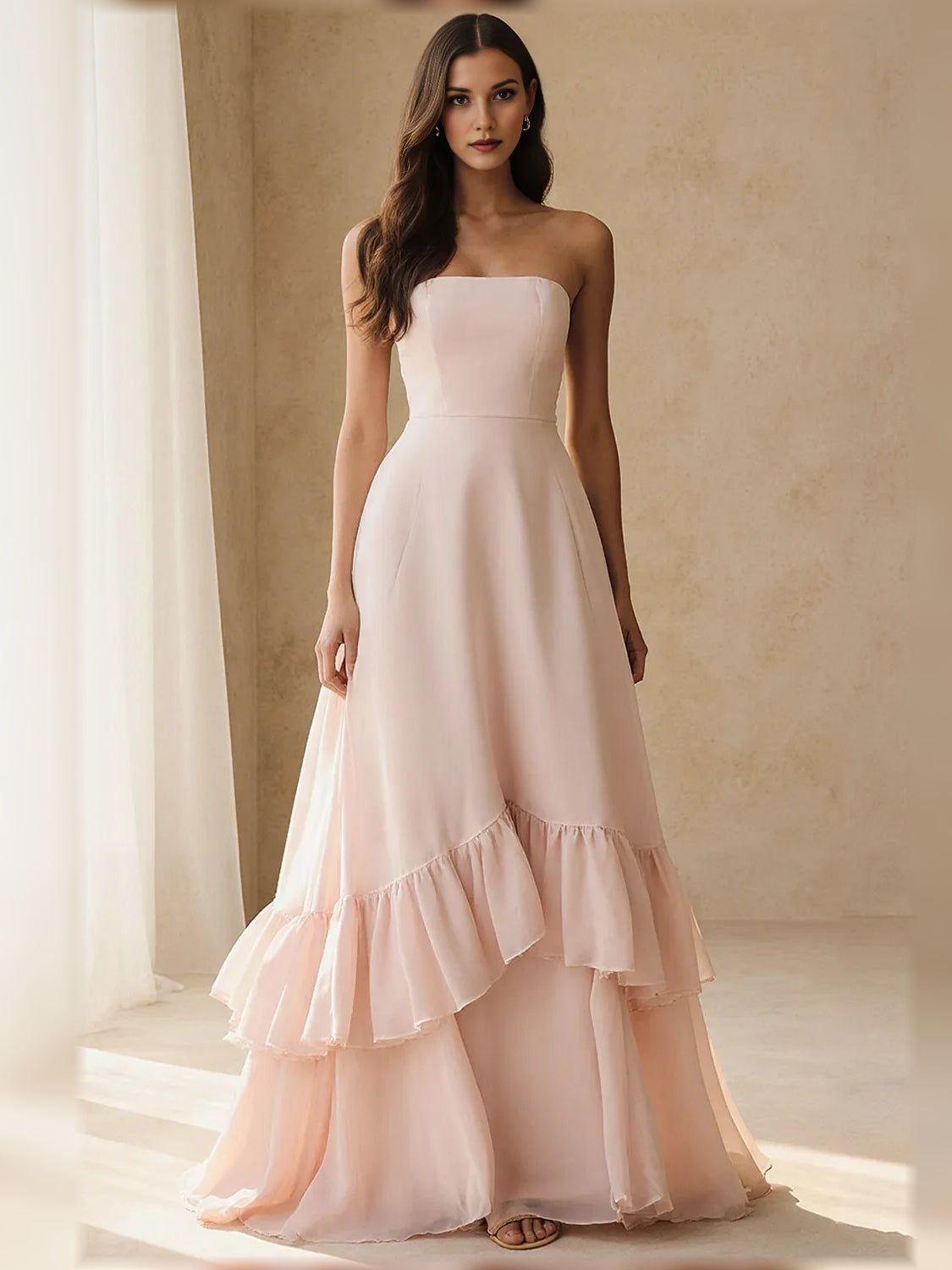 Strapless tiered ruffle A-line formal dress in light pink chiffon, front view