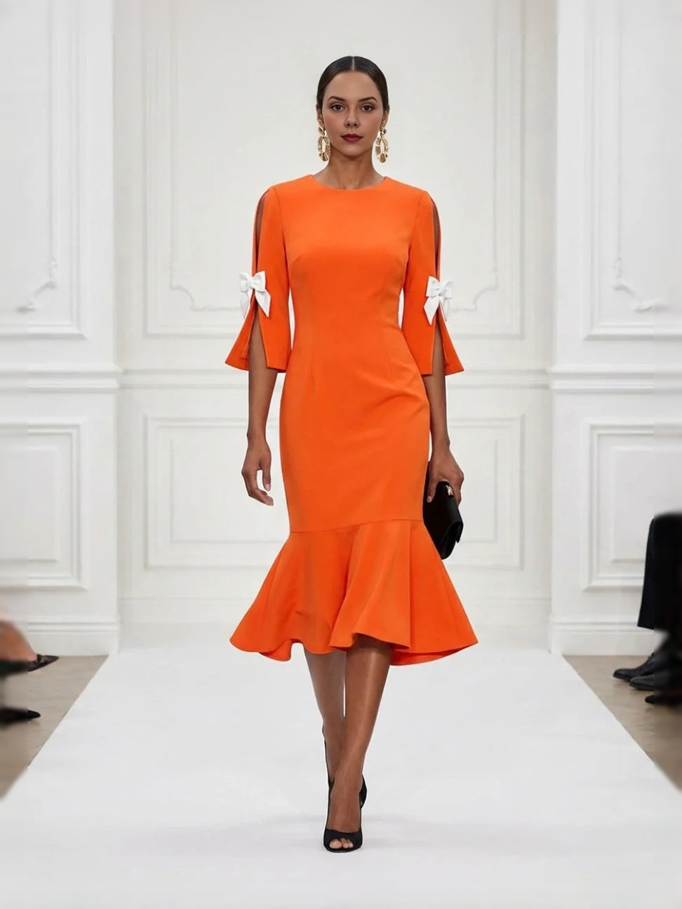 Burnt orange mermaid midi dress with bow-detail flutter sleeves and ruffled hem