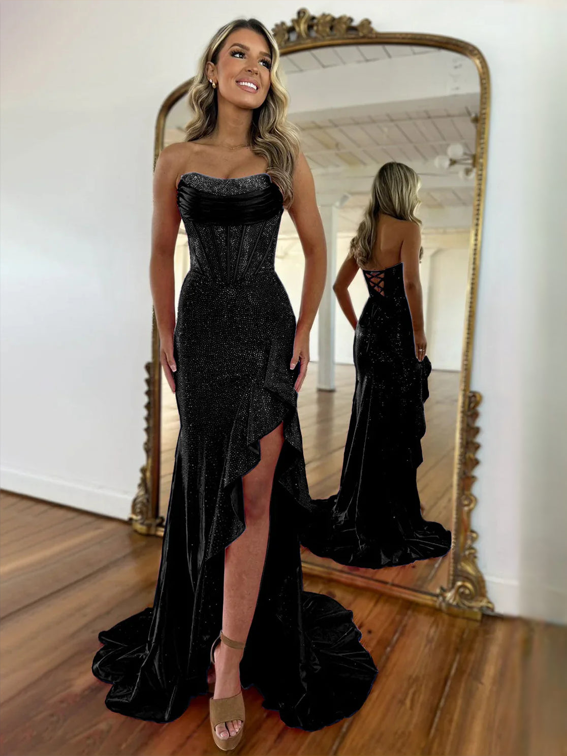 Black corset sweetheart maxi prom dress with draped bodice and ruffled thigh slit