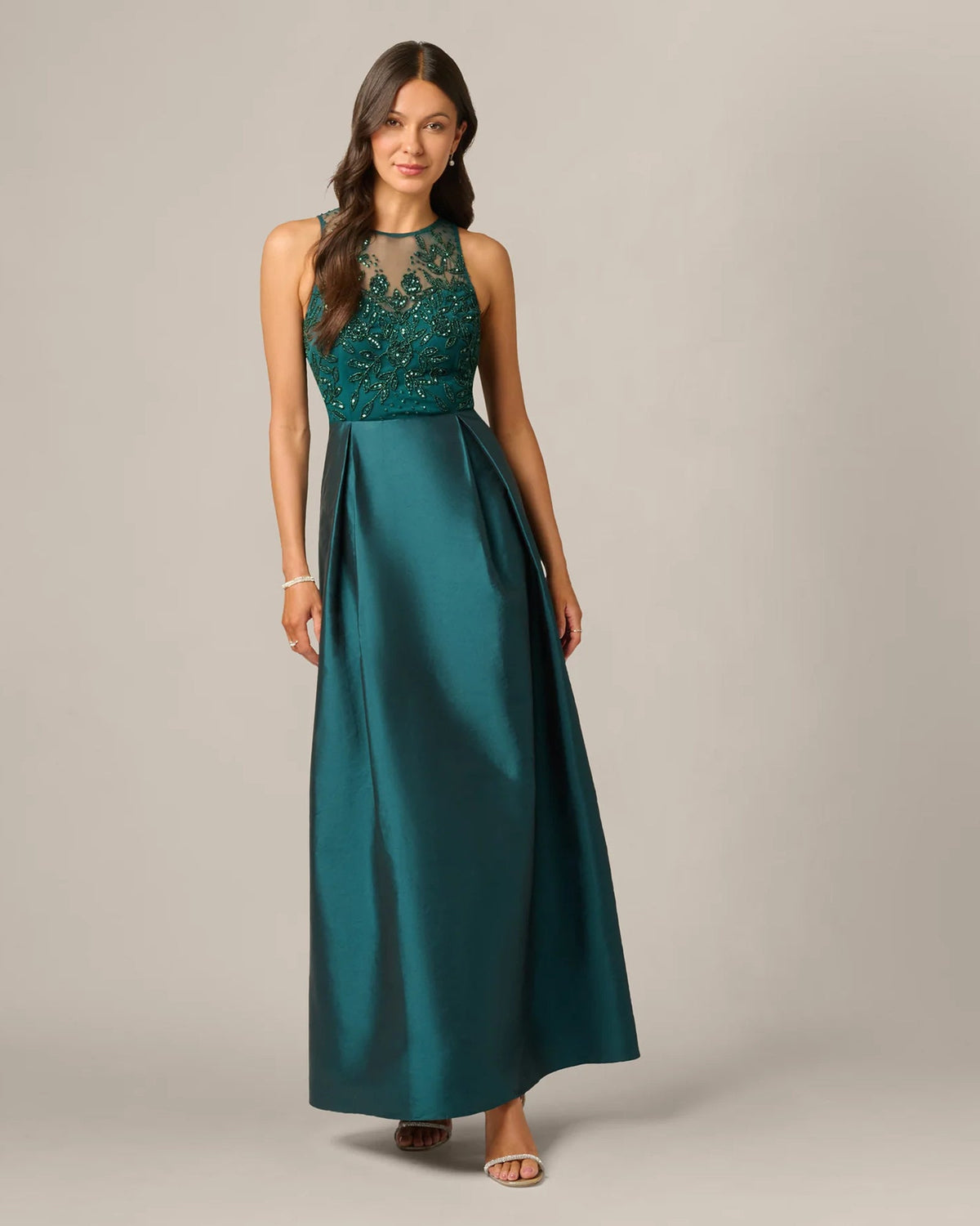 Teal green sleeveless A-line maxi dress with beaded bodice and satin skirt