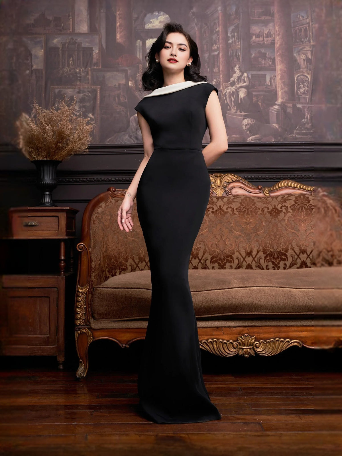 Black high-neck mermaid maxi prom dress with sleeveless bodice and white collar trim