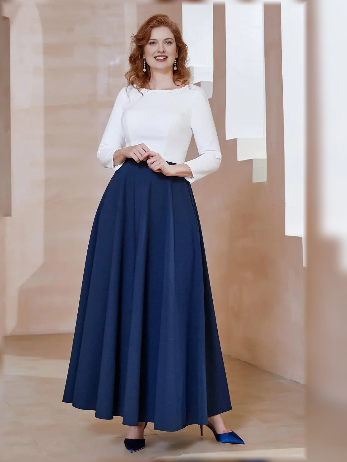 Mother of the bride A-line dress with boat neckline, navy skirt and long white sleeves