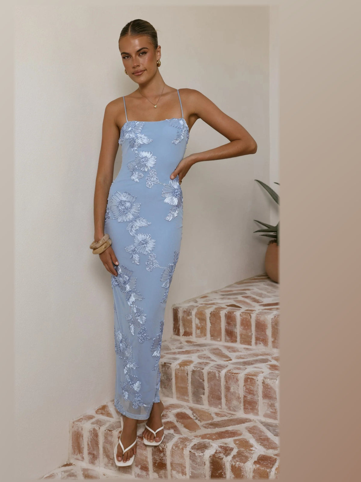 Blue maxi formal dress, front full-length view showing the neckline