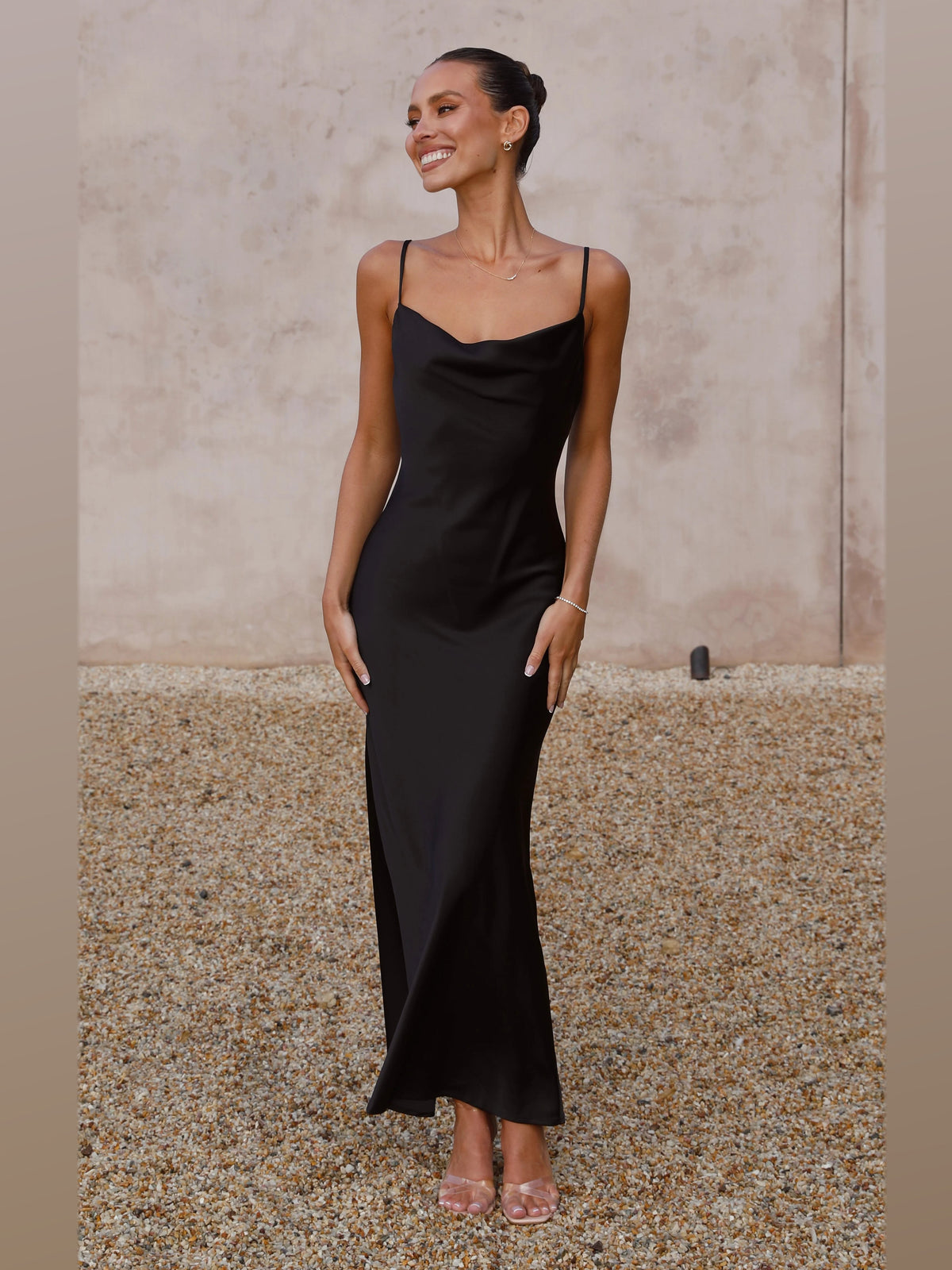 Black maxi formal dress, front full-length view showing the neckline