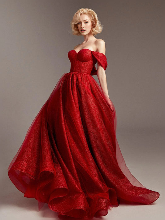 Red strapless corset formal dress with puff sleeves and full floor-length skirt