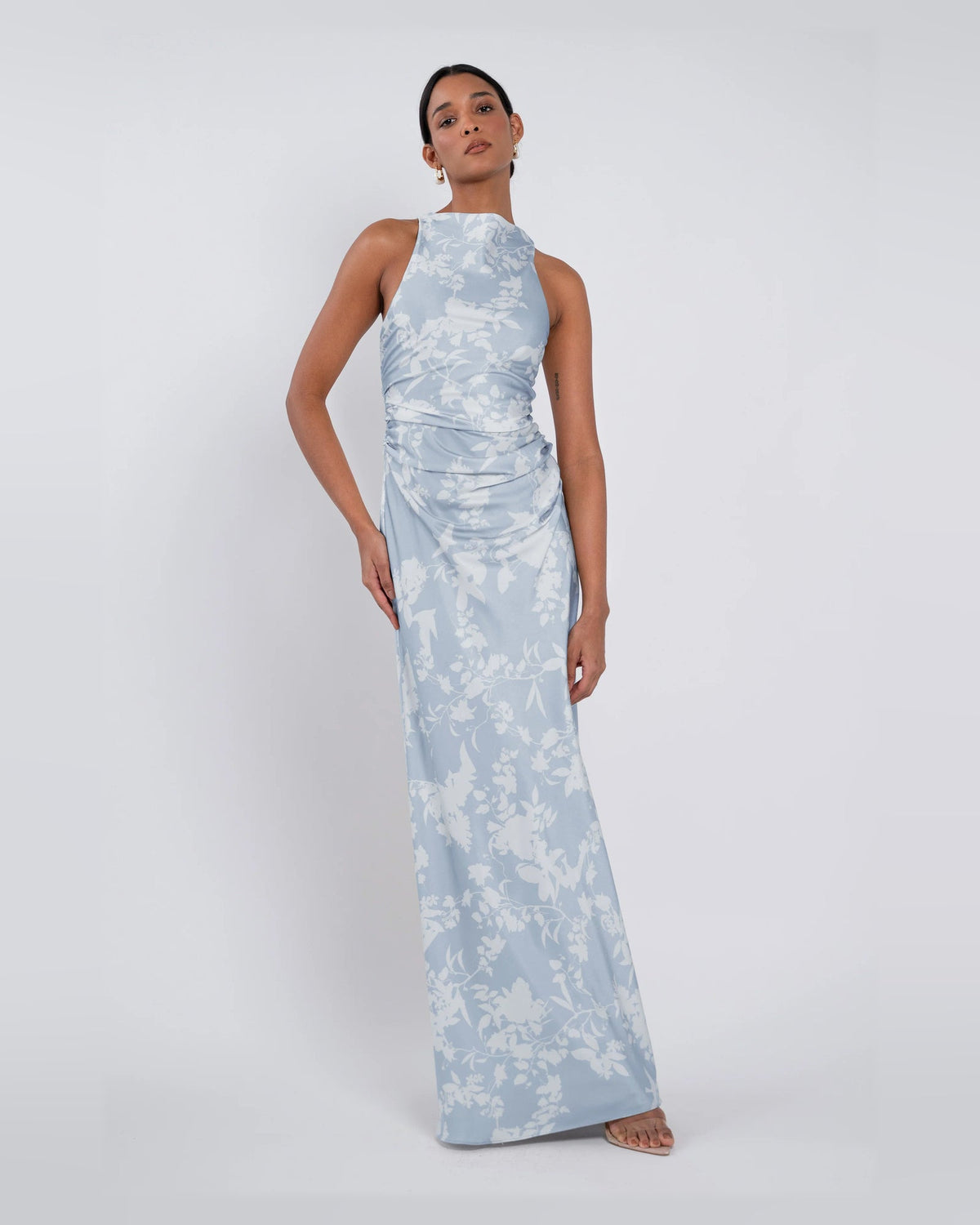 A-line maxi formal dress in light blue with white floral print, sleeveless high neck