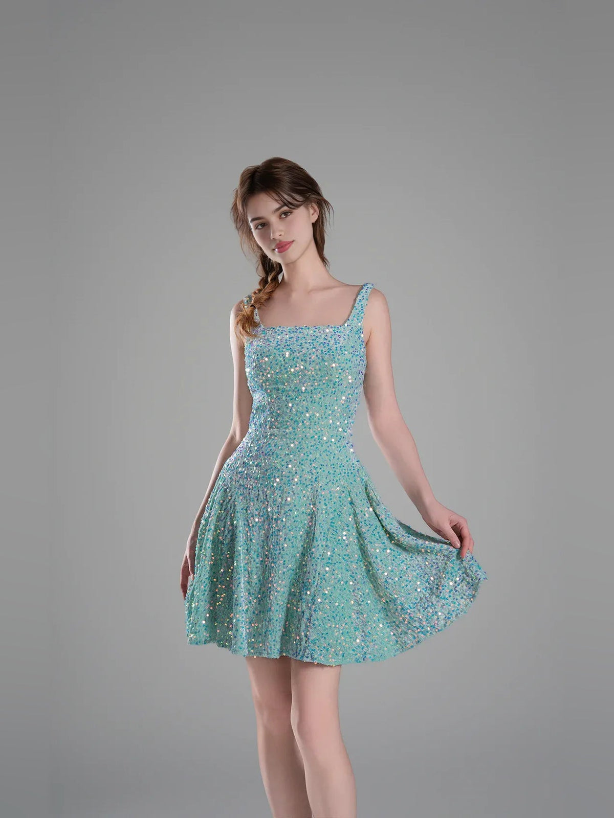 Turquoise sequined A-line mini dress with square neckline and spaghetti straps
