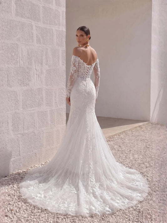 Ivory sweetheart mermaid wedding dress with lace off-shoulder bodice and long sleeves