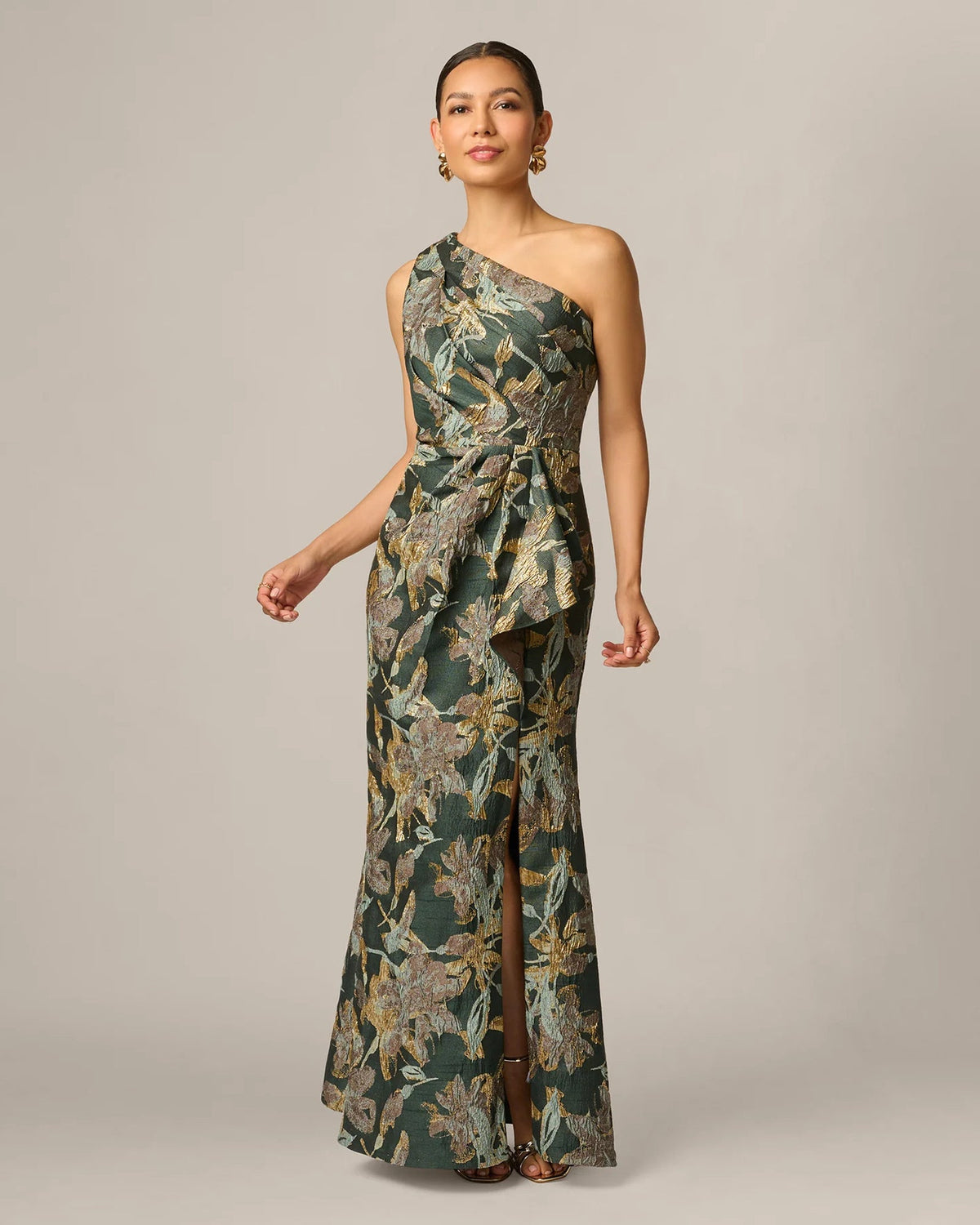 One-shoulder A-line maxi dress in dark green with gold floral print, draped waist