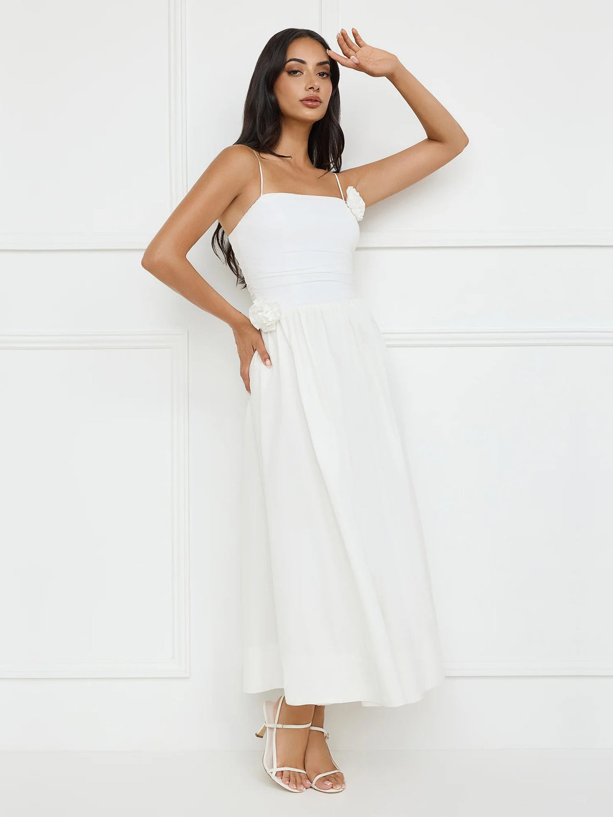 White a-line maxi formal dress with floral appliqué, full-length front view