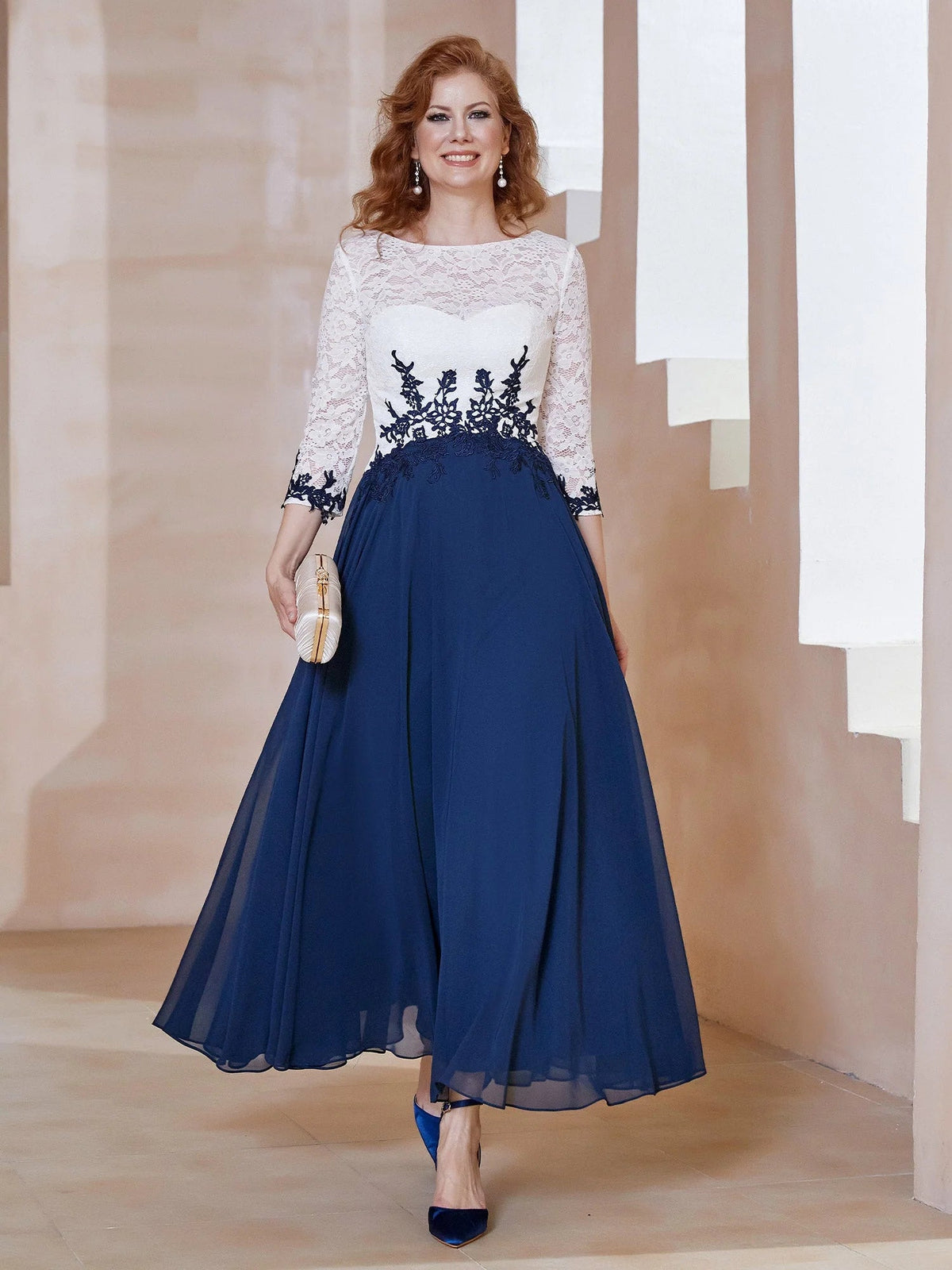 Formal A-line ankle-length dress with white lace bodice, navy floral appliqué, and navy skirt
