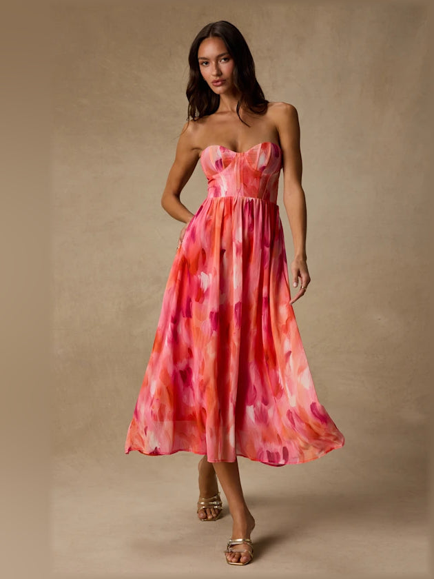 Coral pink abstract strapless midi formal dress with fitted bustier and flared skirt
