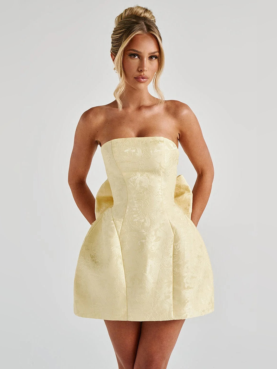 Lemon strapless mini homecoming dress with corset bodice and fitted skirt