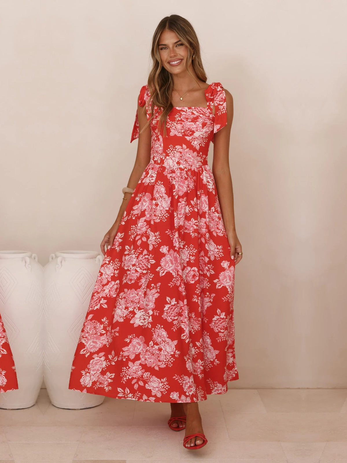 Red Floral a-line maxi formal dress with V-neckline, full-length front view