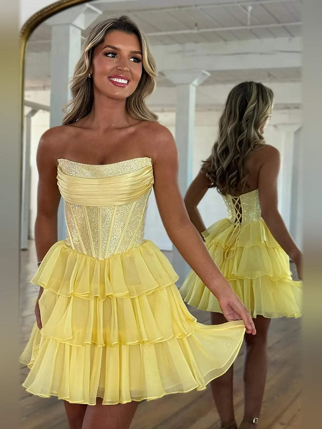 Lemon yellow strapless A-line mini homecoming dress with ruffled tiers and sparkly bodice