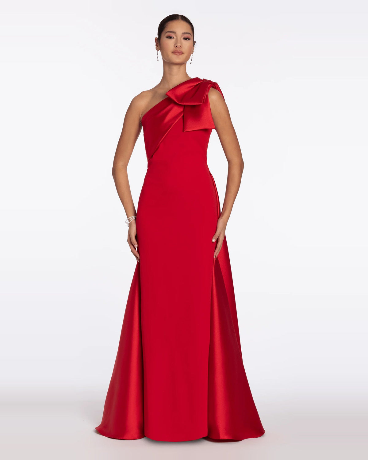 Red one-shoulder column maxi dress with large bow at asymmetrical neckline and back slit