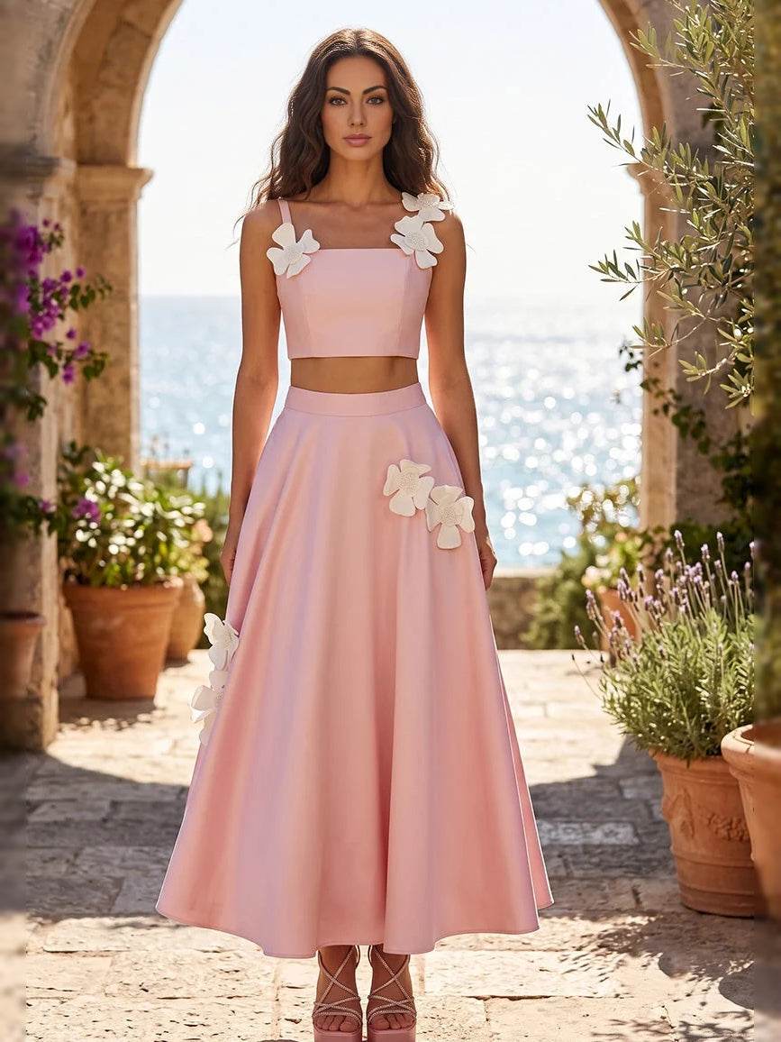 Light pink satin A-line midi dress with square neckline and white floral appliques