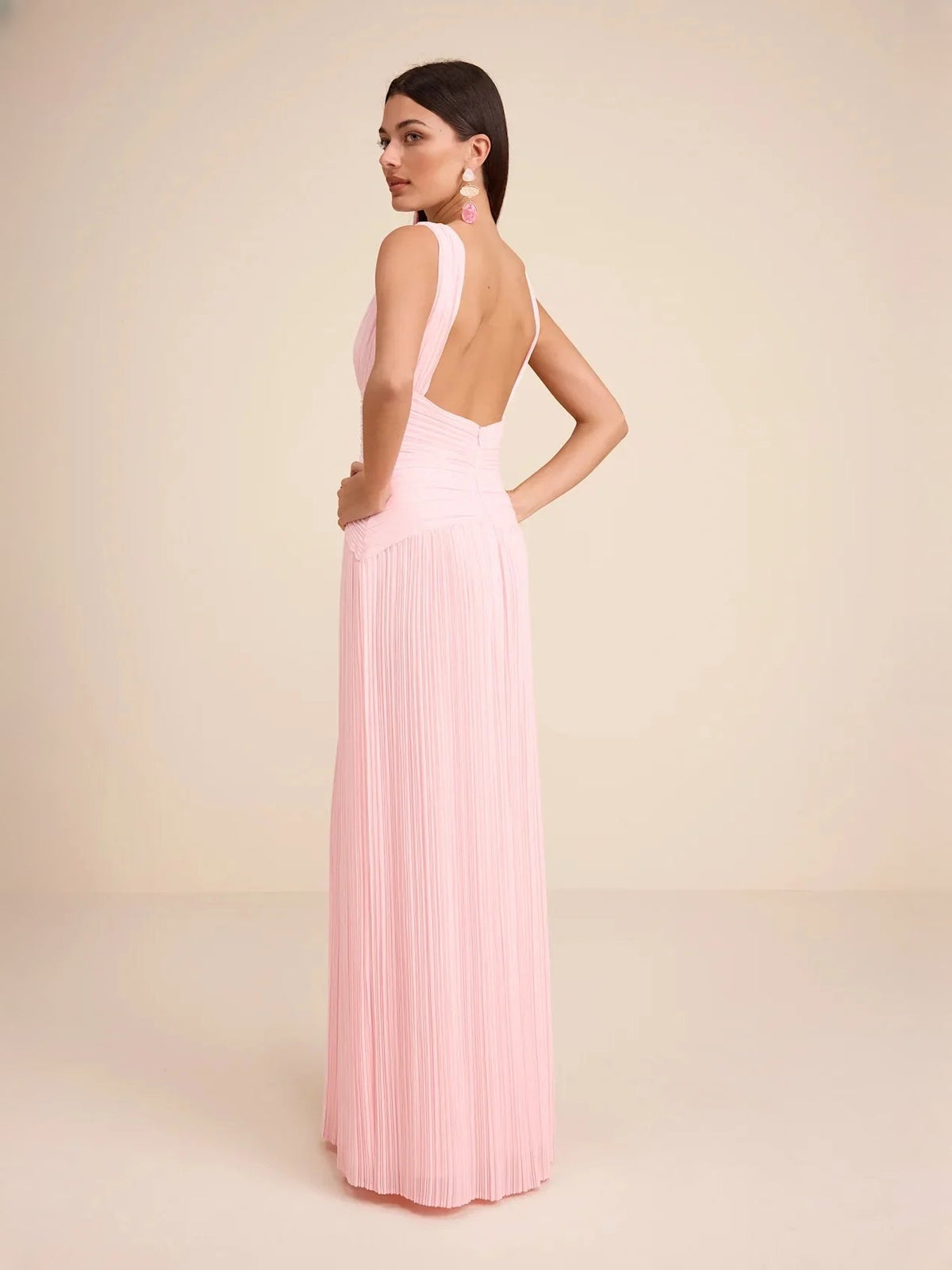 Pink V-neck tiered maxi dress with ruched bodice and pleated chiffon skirt
