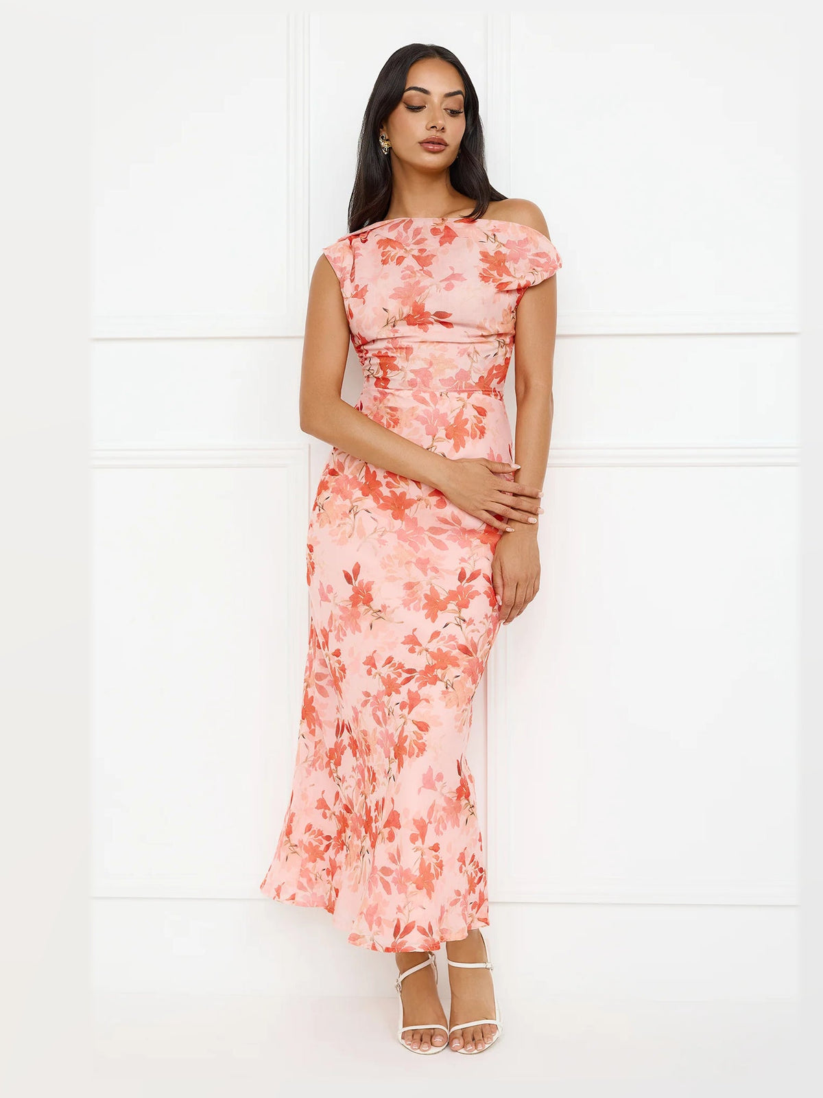 Orange formal dress with a-line silhouette and maxi length